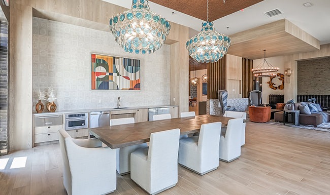 lobby with large chandeliers and large table