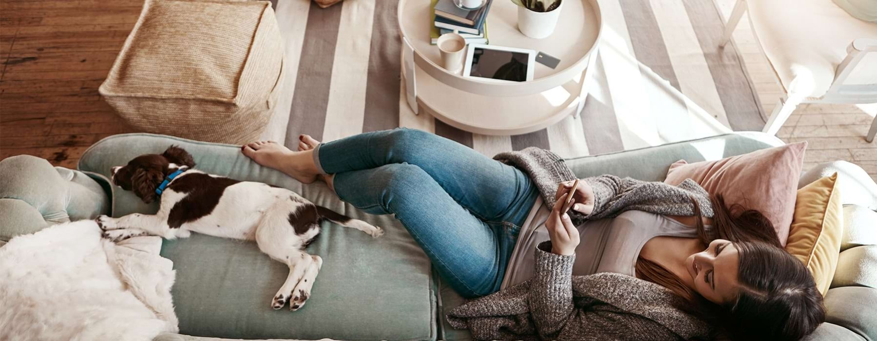 woman on couch with dog